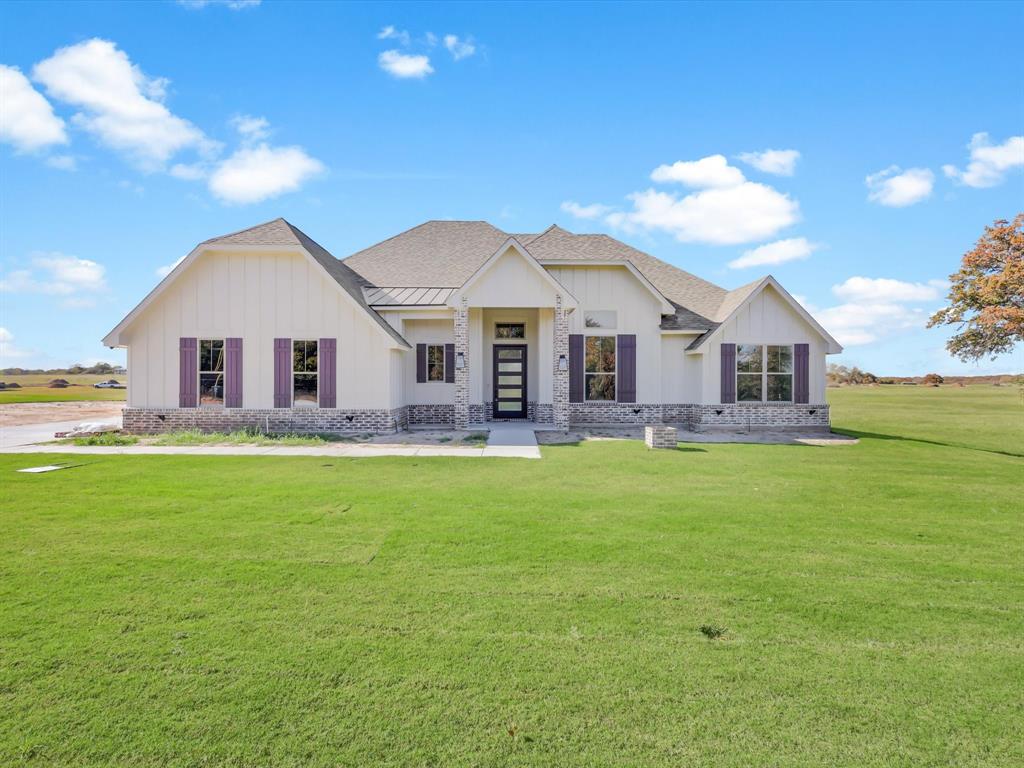 a view of a house with a big yard