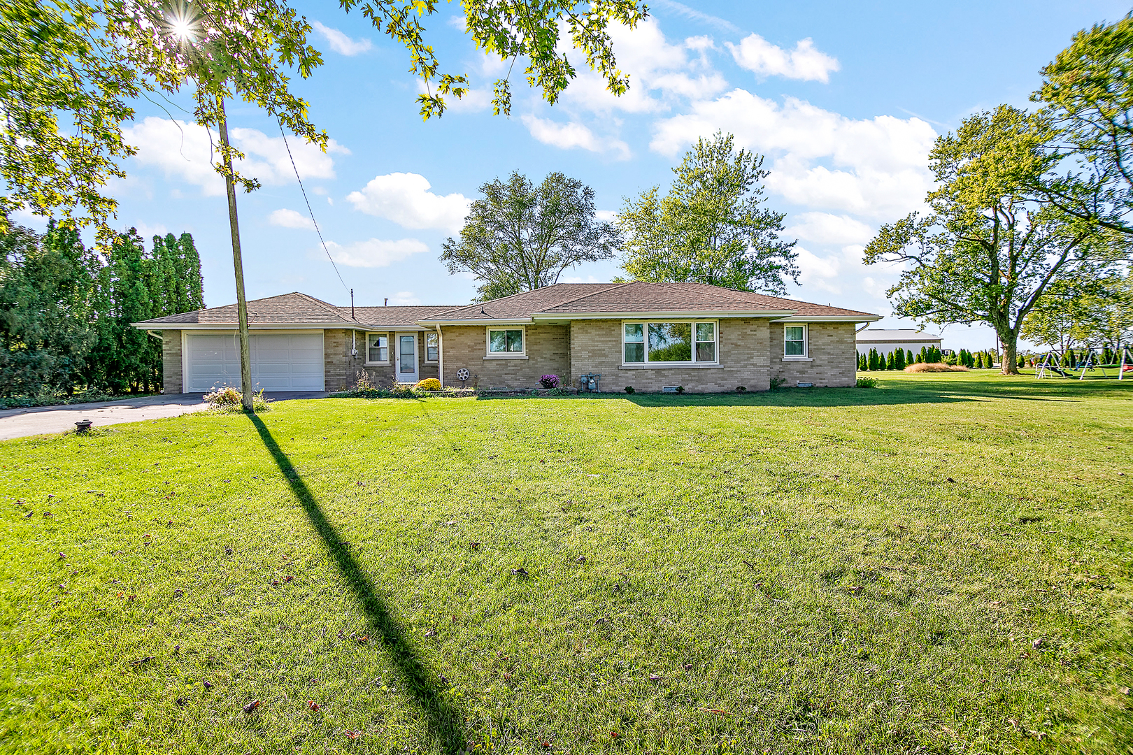 a view of a house with a big yard