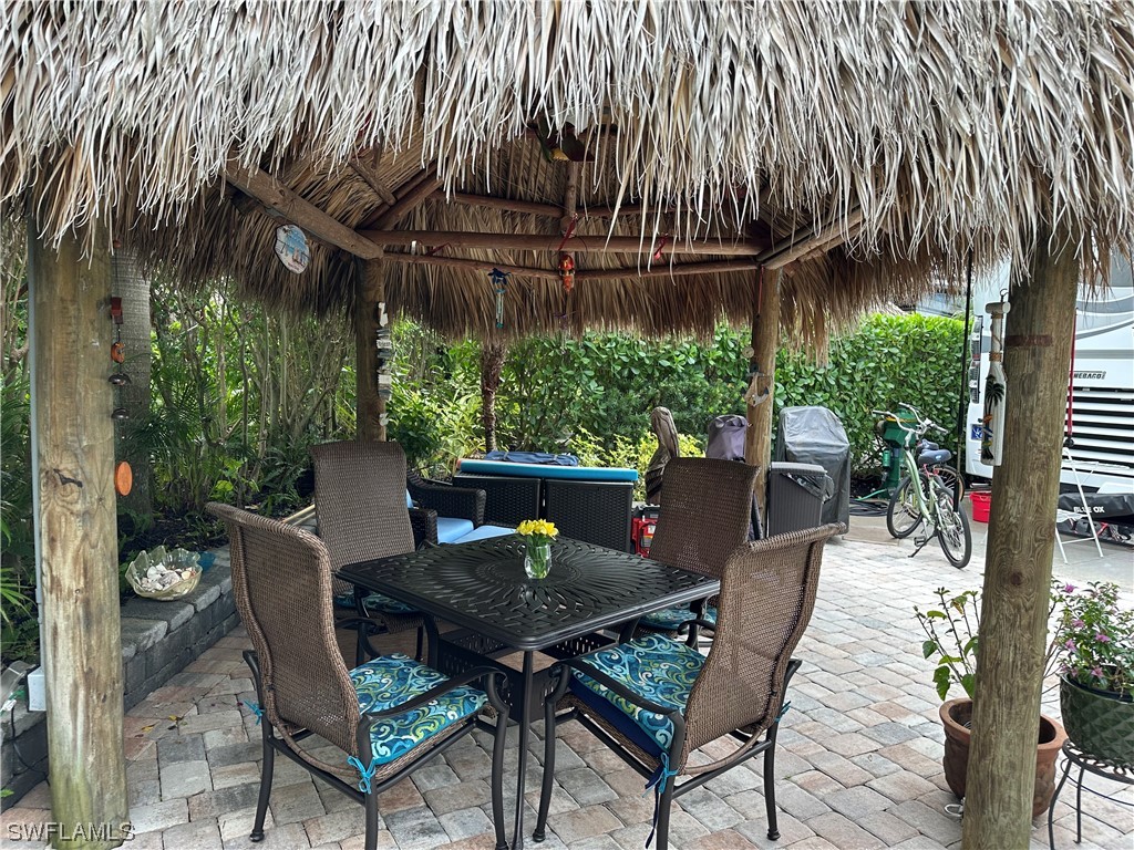 a view of a table and chairs in patio