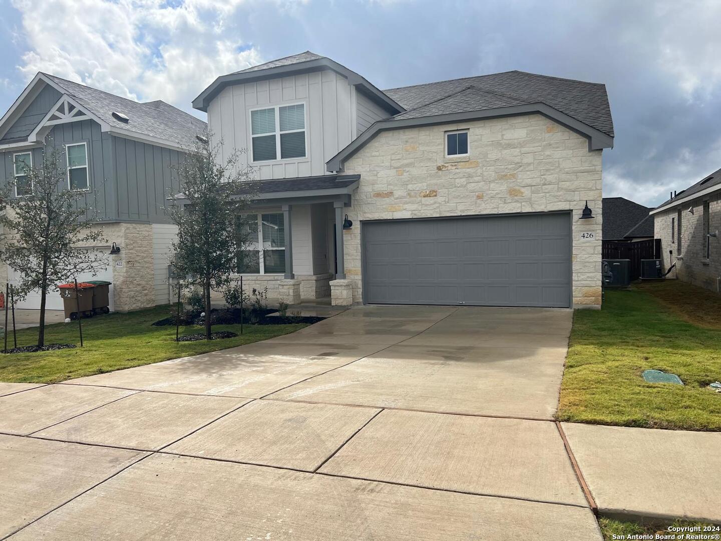 a front view of house with yard