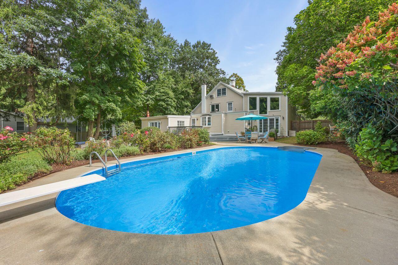 a view of outdoor space and swimming pool