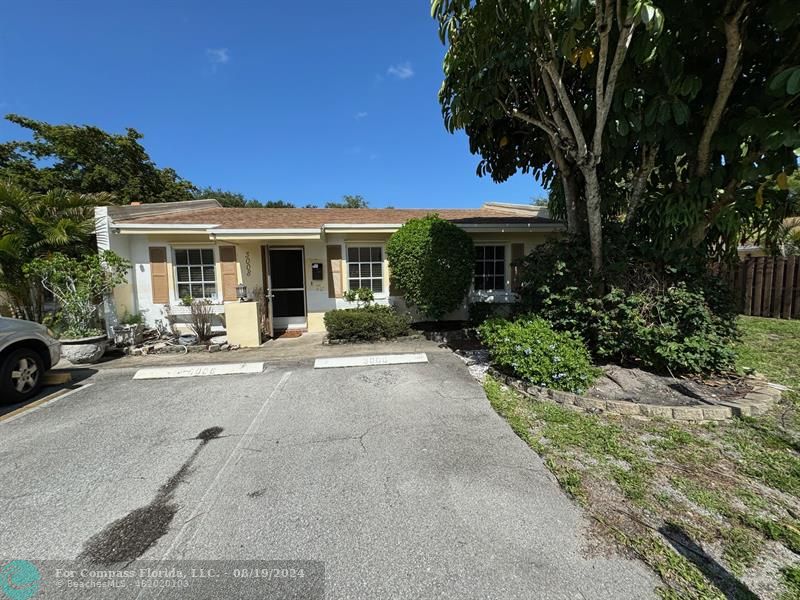 a view of a house with a patio