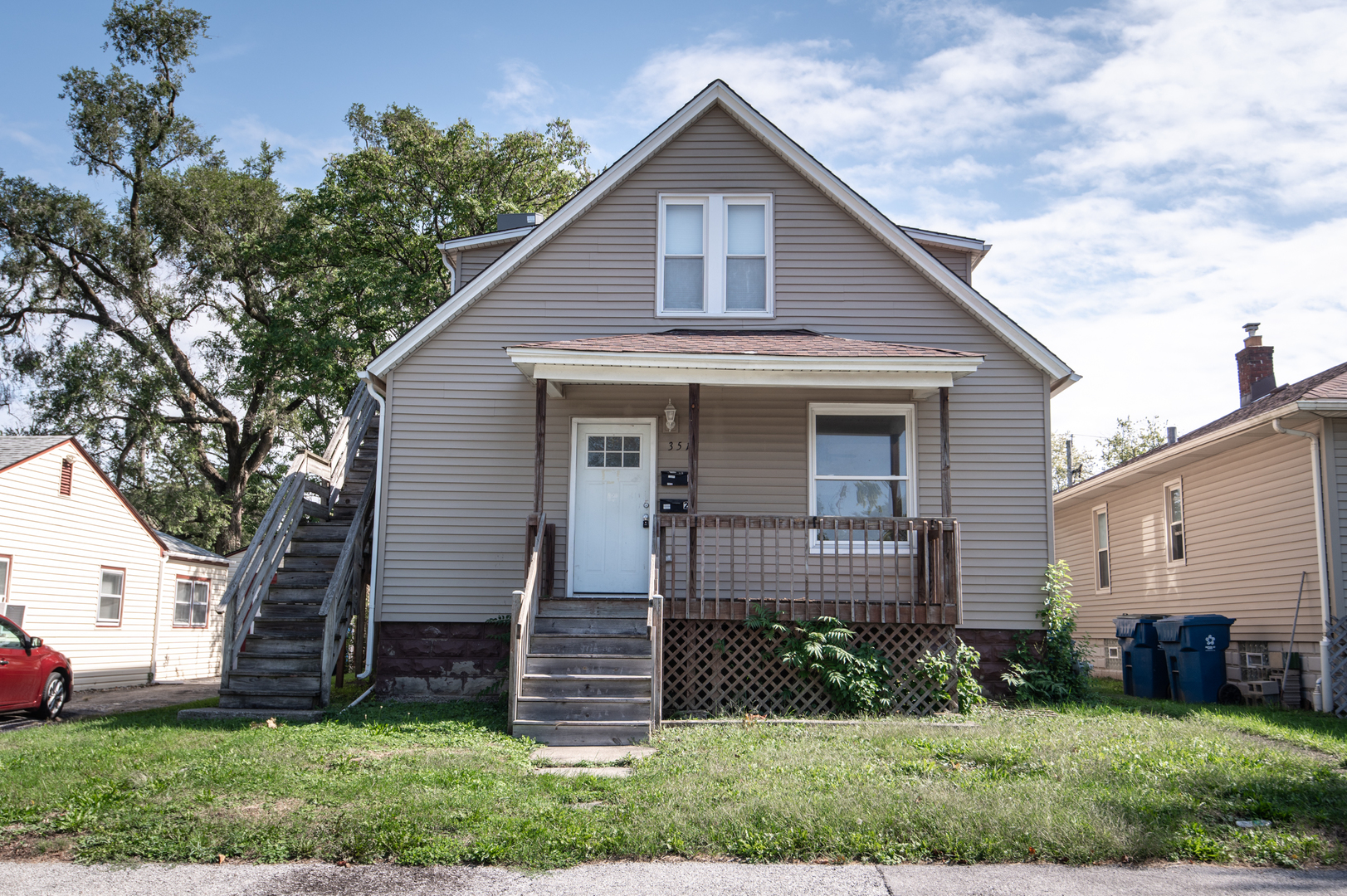 front view of a house and a yard