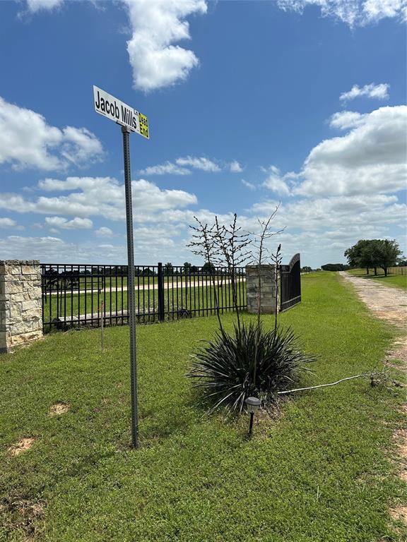 a view of a park with a sign board