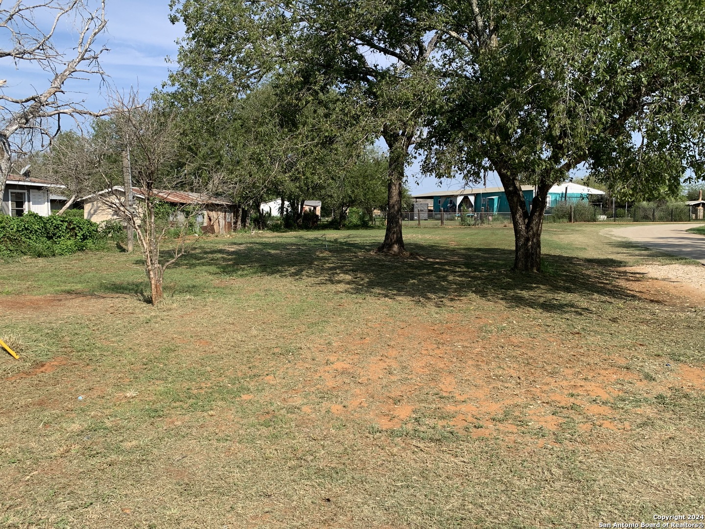 a house with trees in front of it