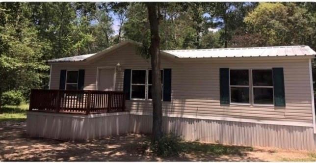 a front view of a house with garage