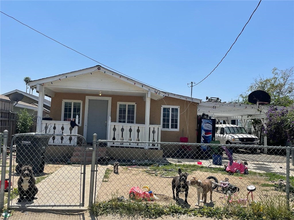 front view of a house with a patio