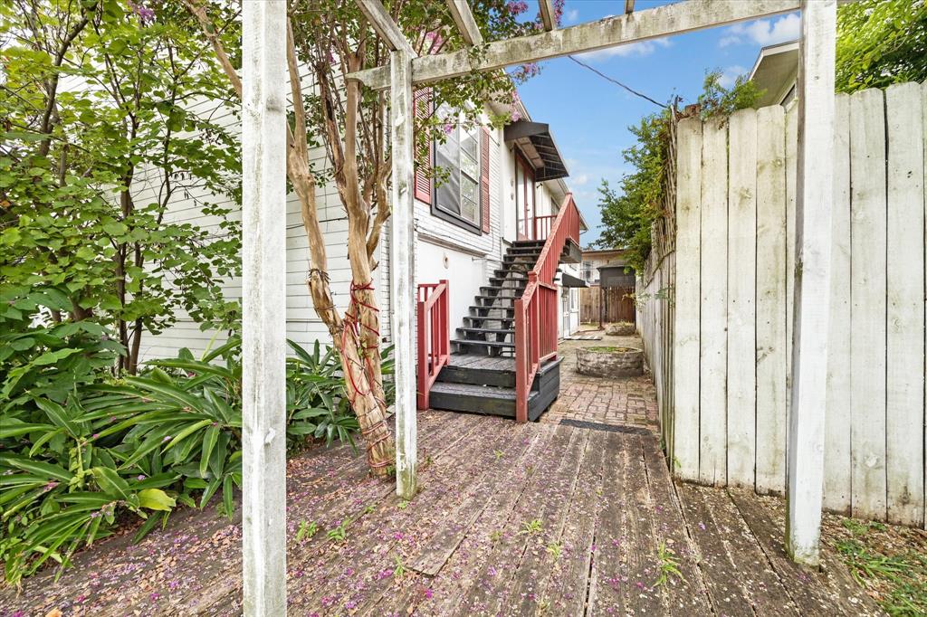 a view of a house with a small yard