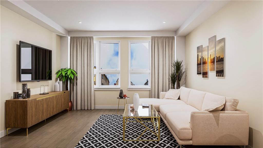 a living room with furniture and a potted plant