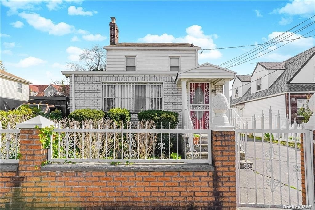 a house view with a garden space