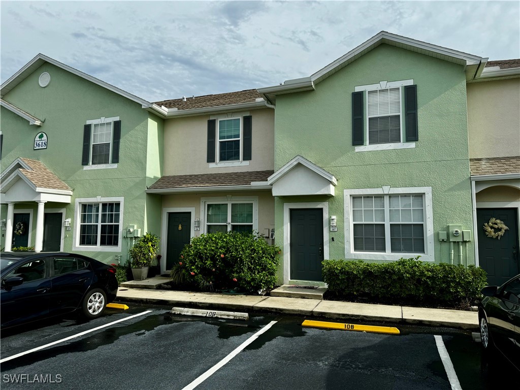 a front view of a house with yard