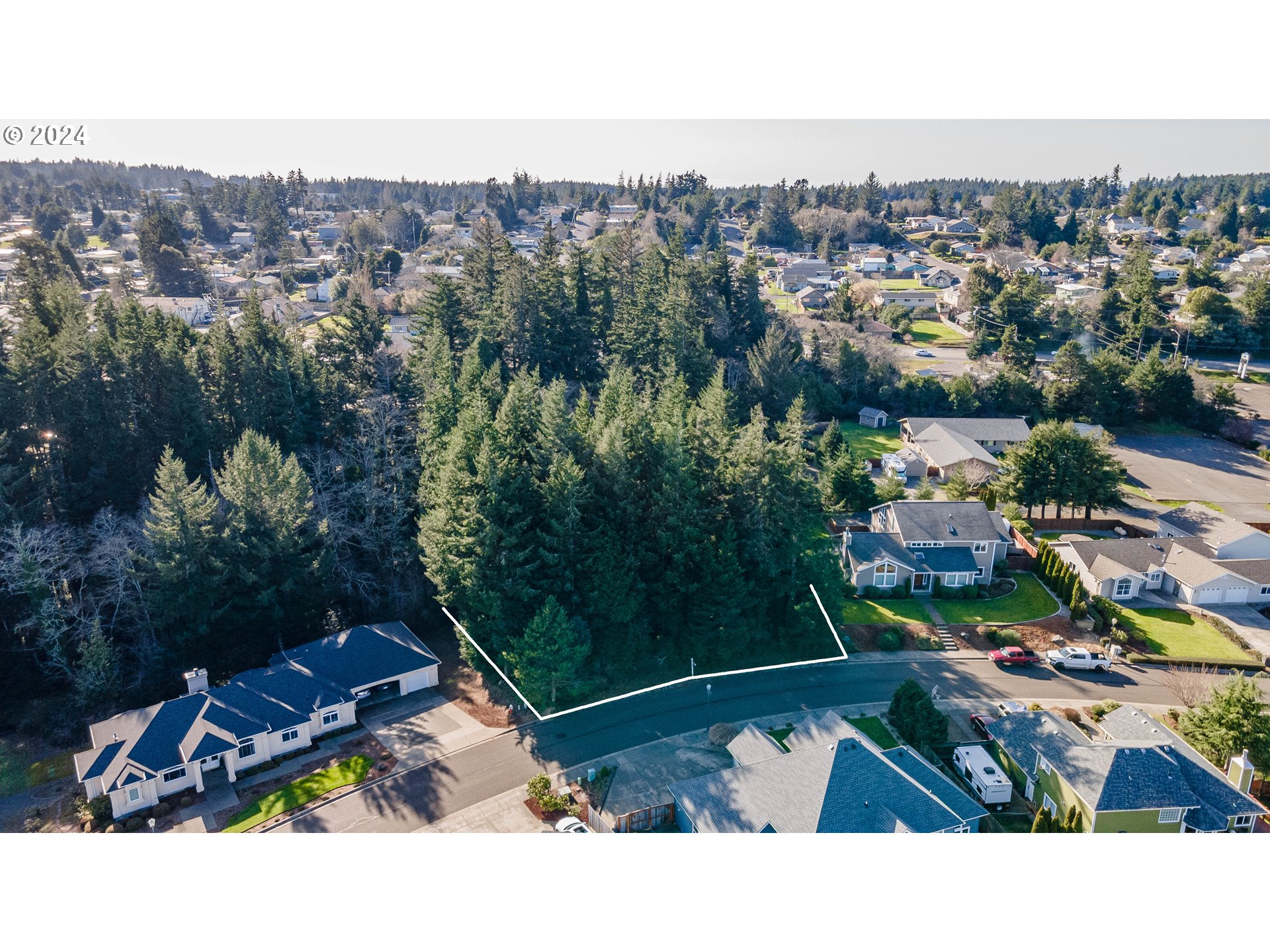 an aerial view of a house with a garden