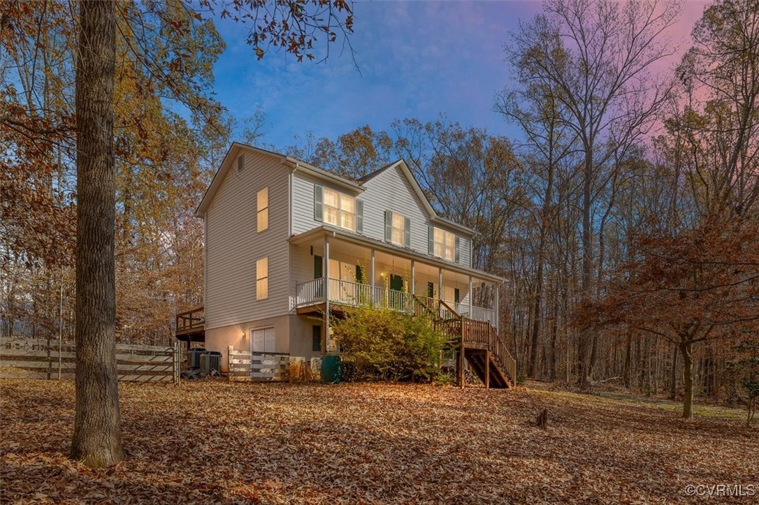 View of front of property featuring a porch and ce