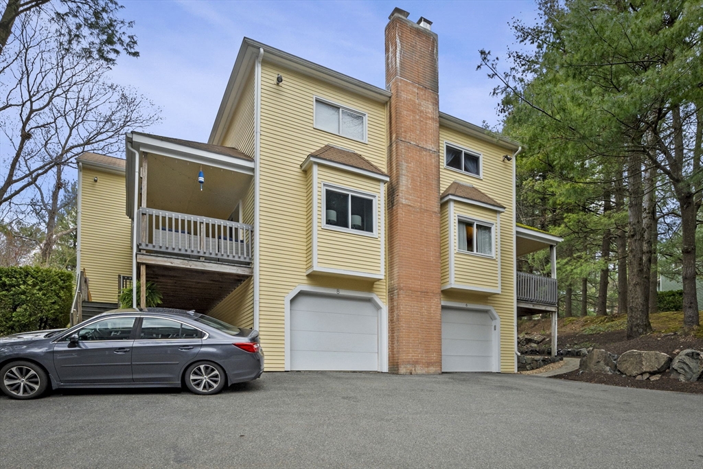 a car parked in front of a house