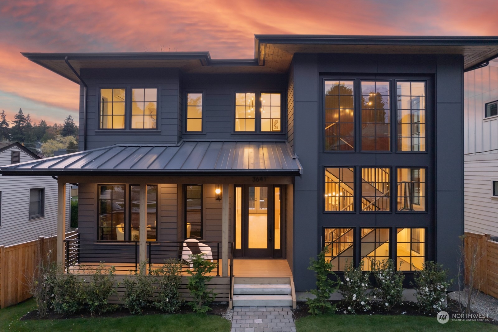 a front view of house with an outdoor space