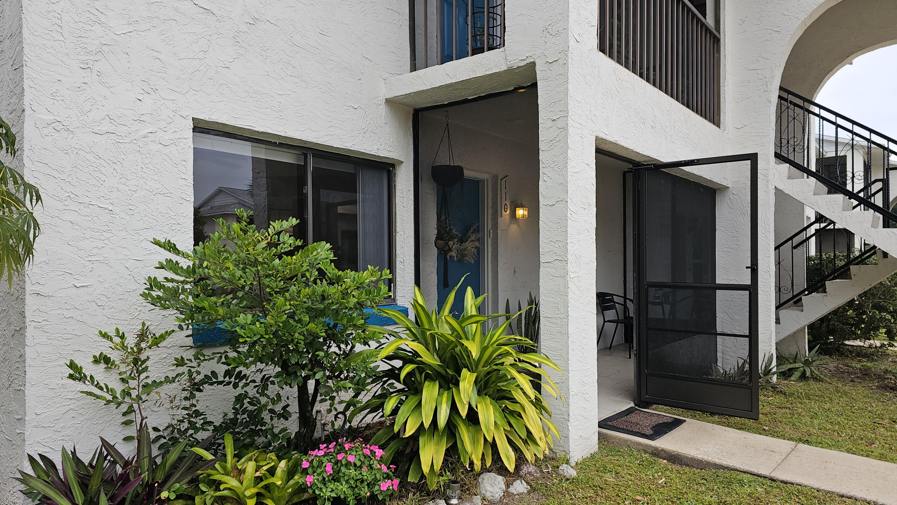 a plant is in front of a house