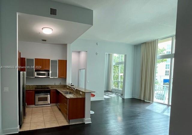 a room with wooden floor and furniture