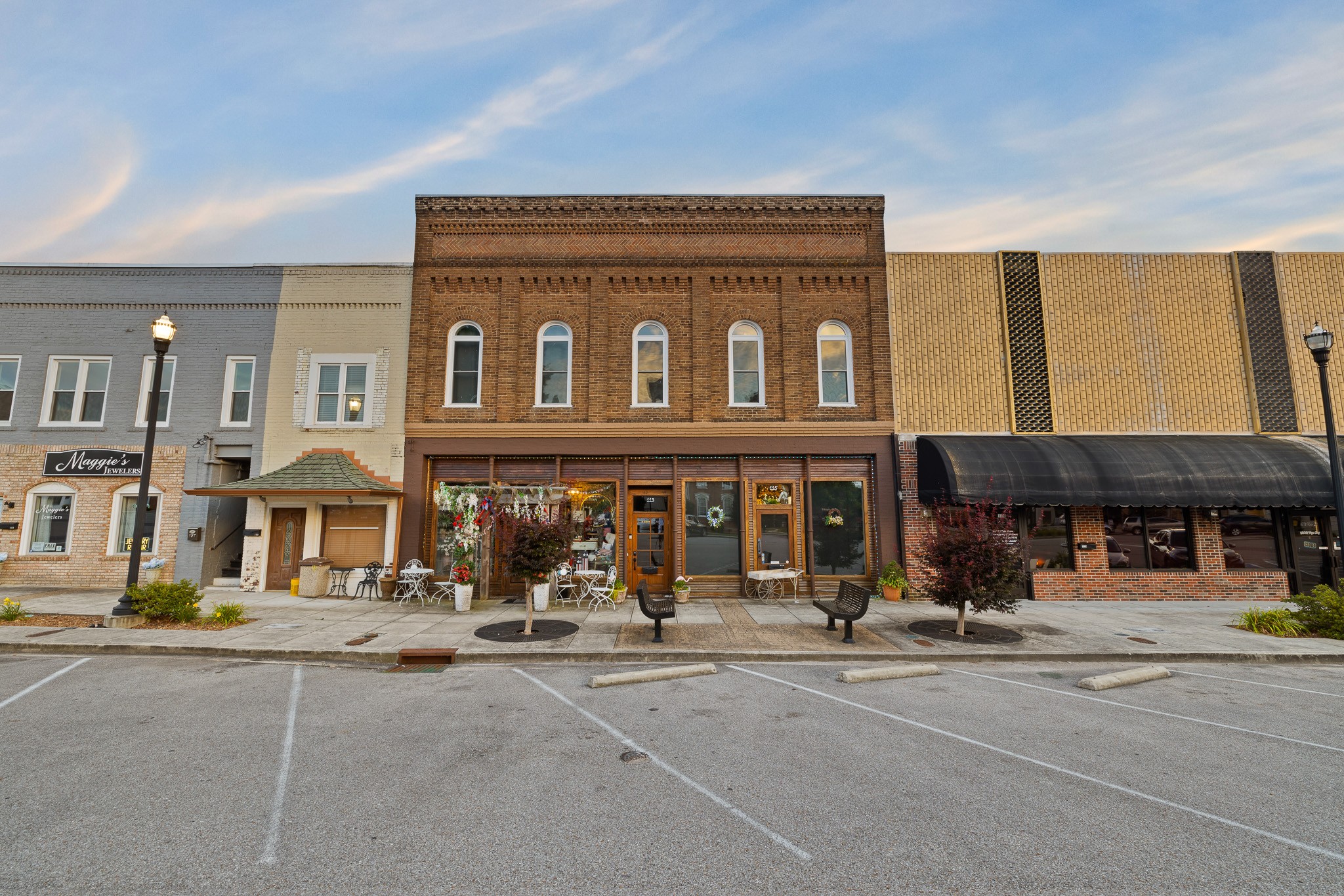 a view of a building with a street