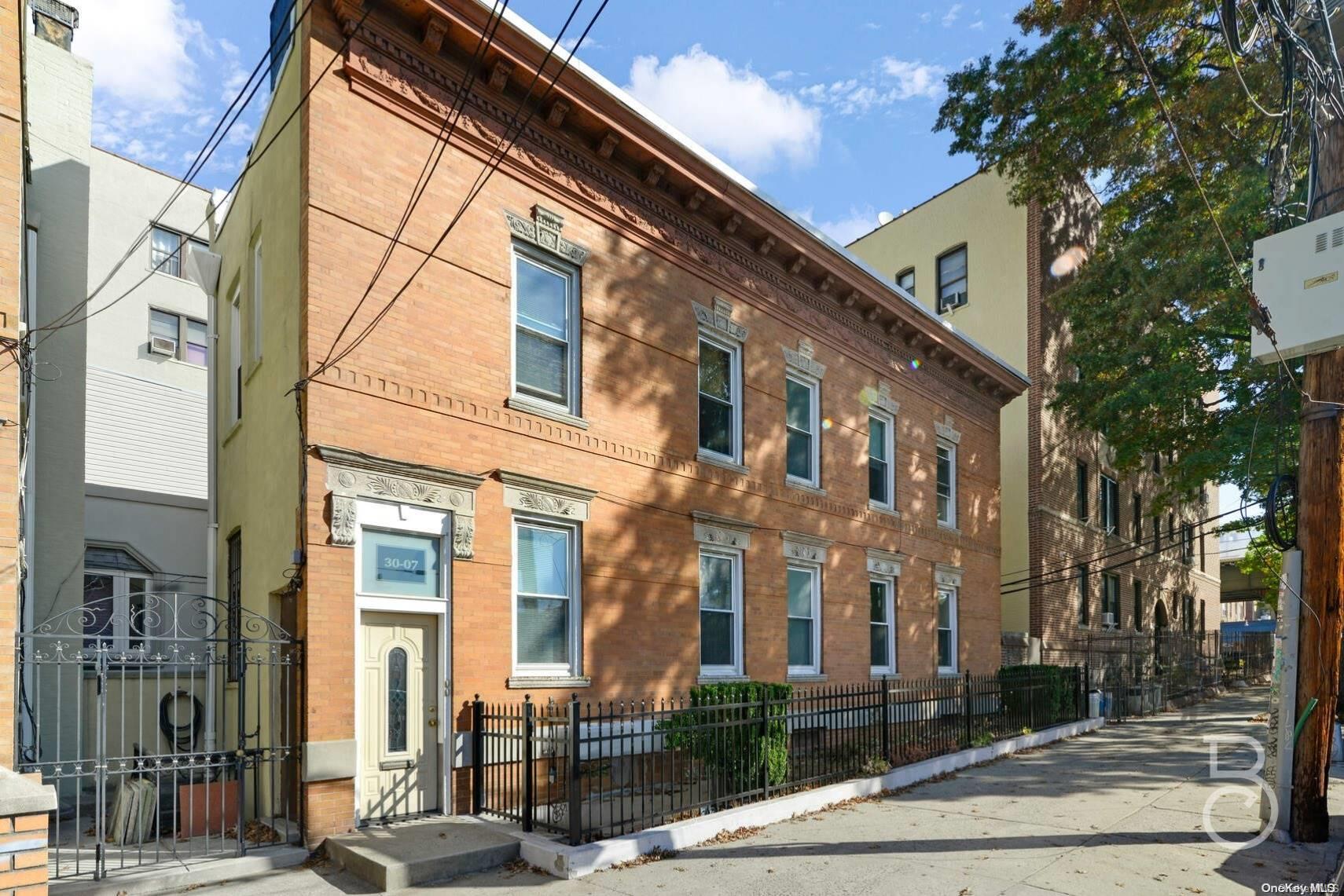 a front view of a building with street view