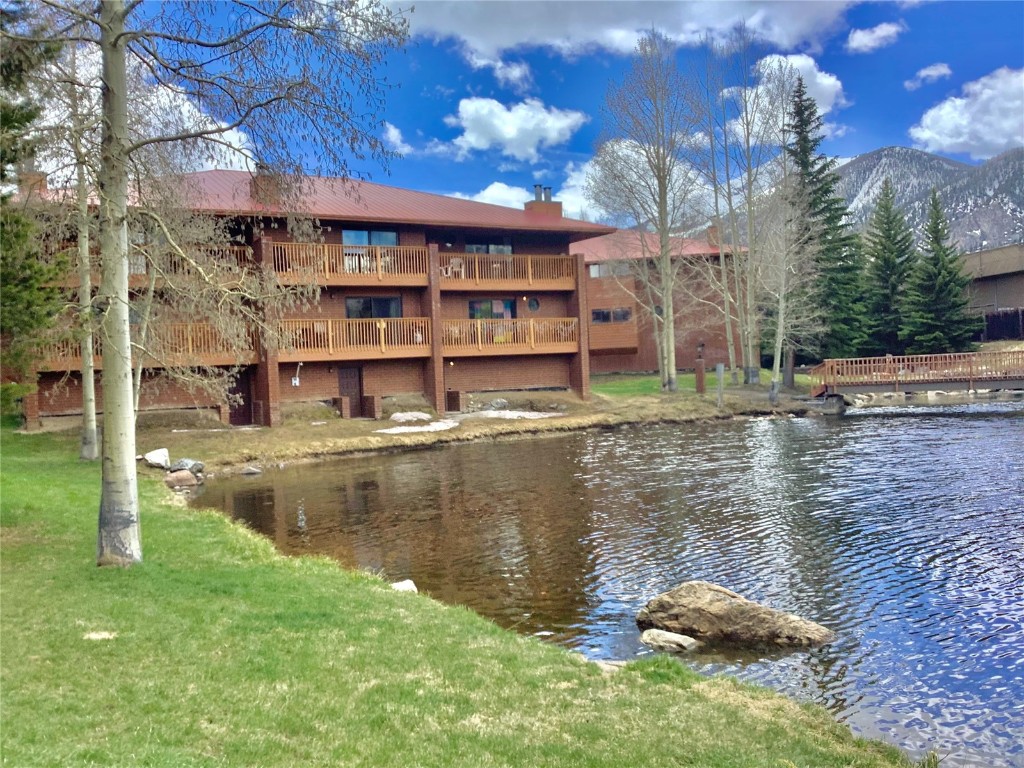 a view of a lake with a house