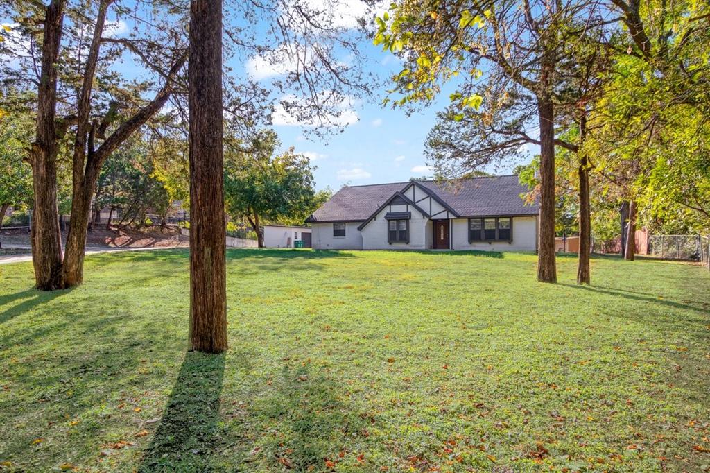 a house view with garden space