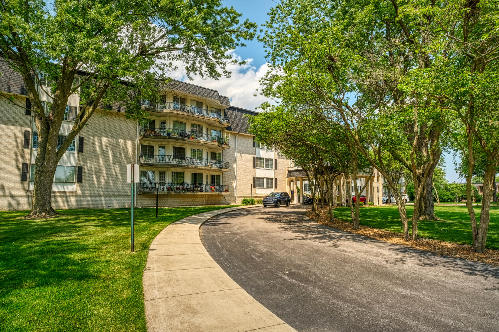 a view of a building with a yard