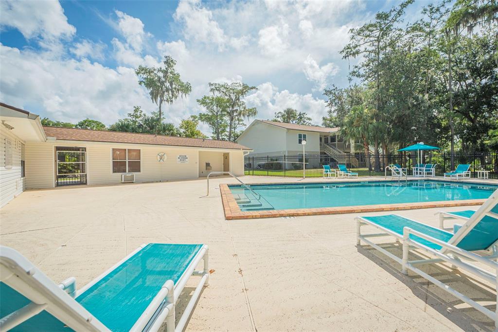 a view of a house with a swimming pool