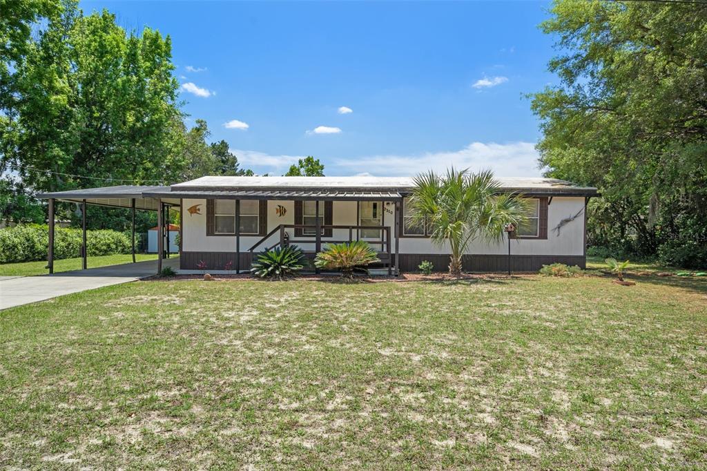 front view of a house with a yard