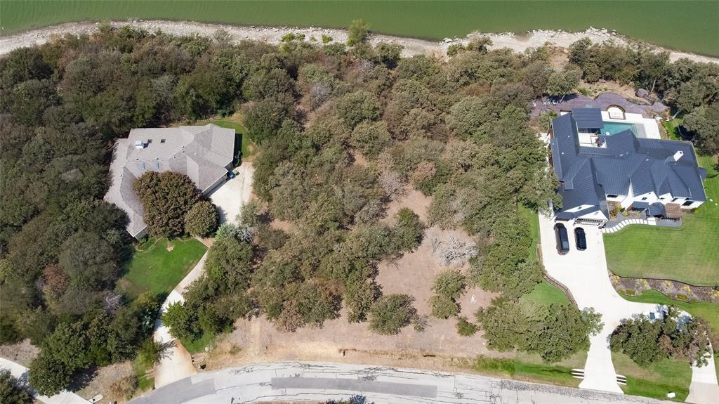 an aerial view of a house with outdoor space