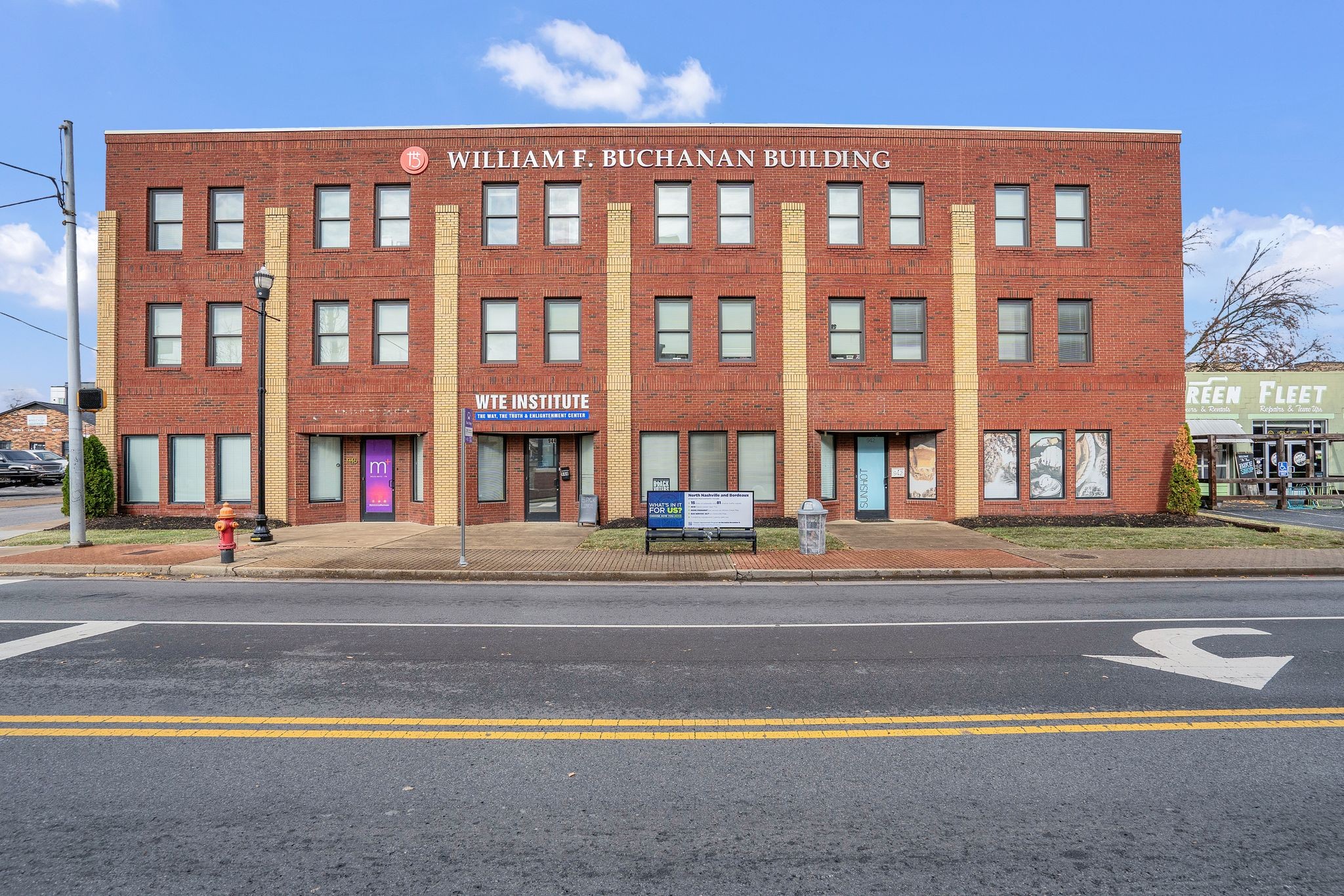 a view of building with a street