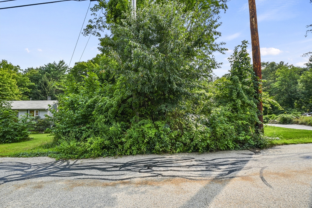 a view of a house with a street