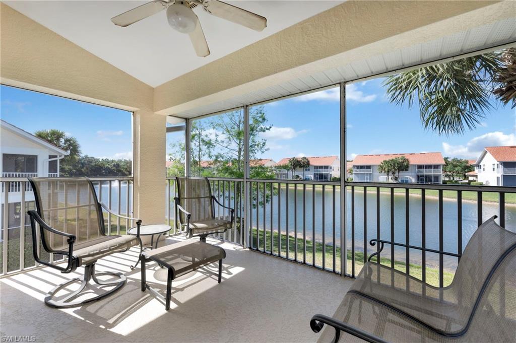 a view of a balcony with furniture