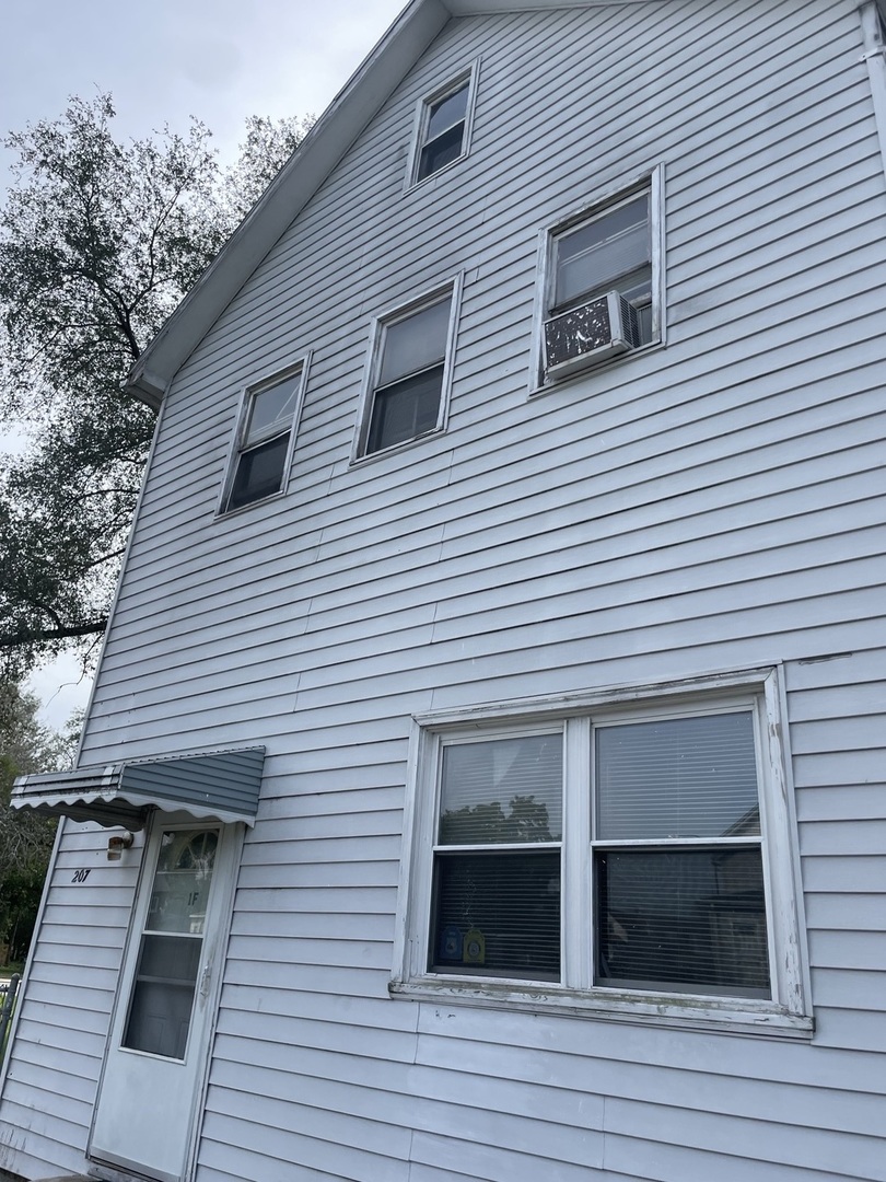 a view of a house and deck