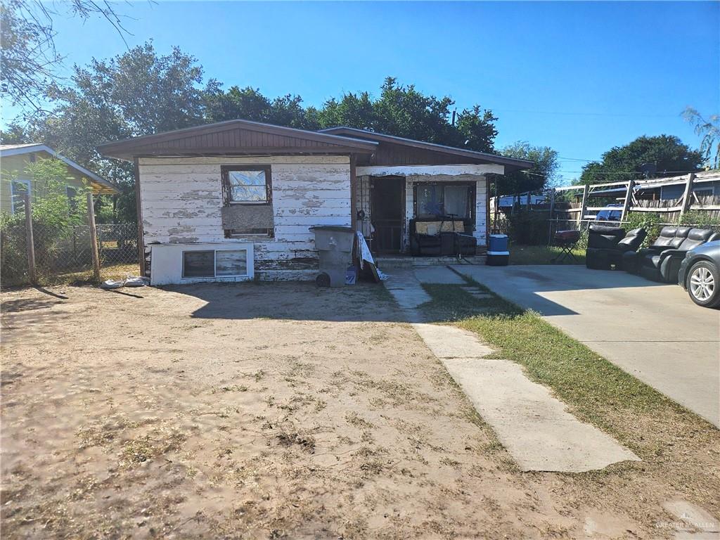 front view of a house with a patio