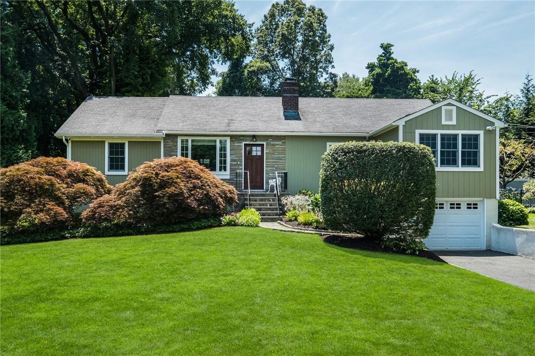 Front of this pristine Ranch style home