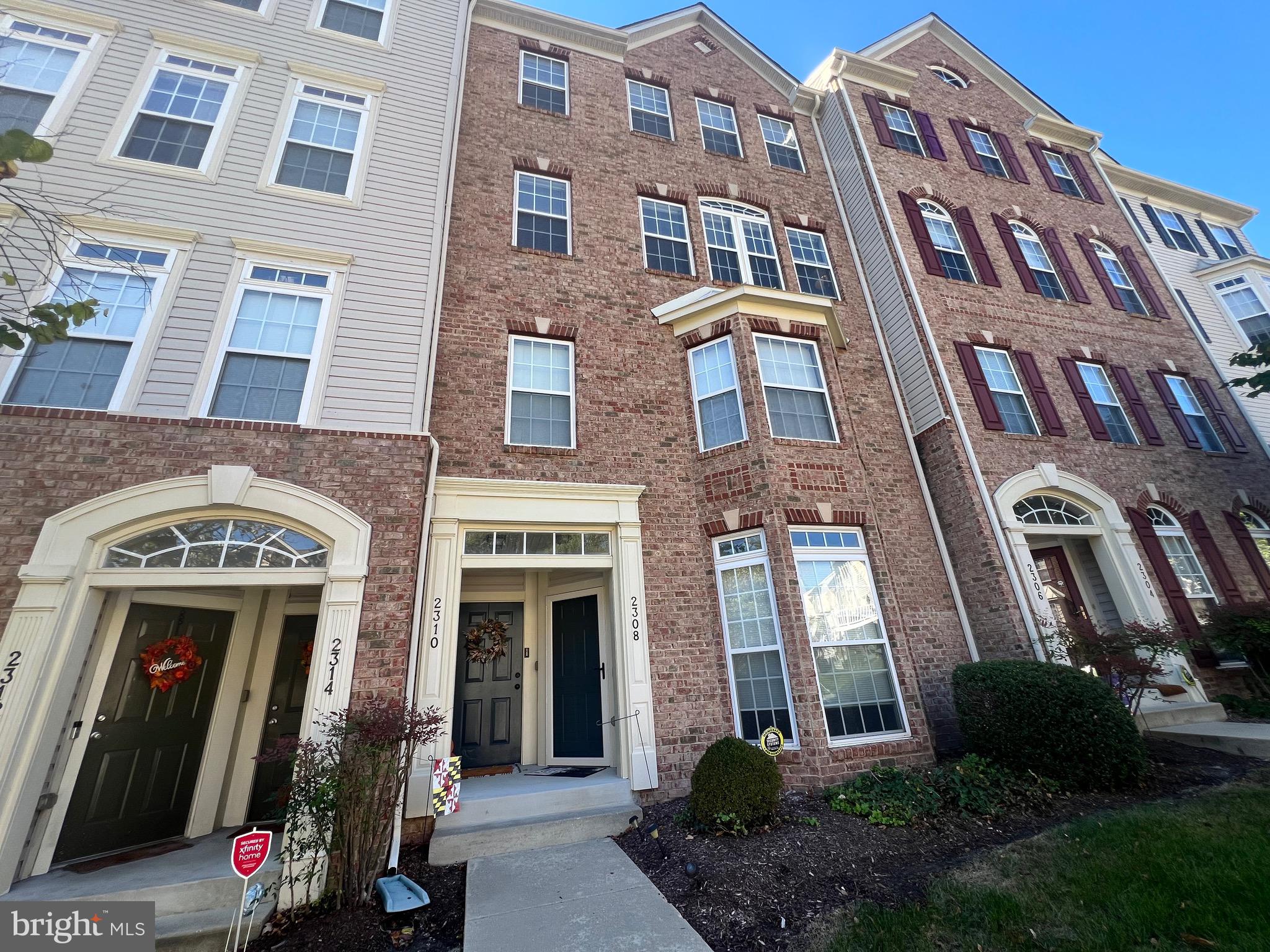 a front view of a multi story residential apartment building