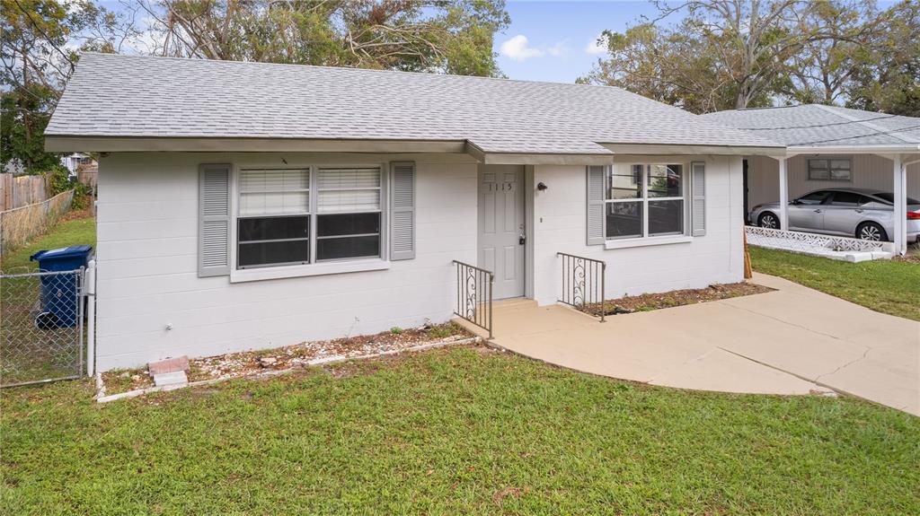 a house with yard in front of it