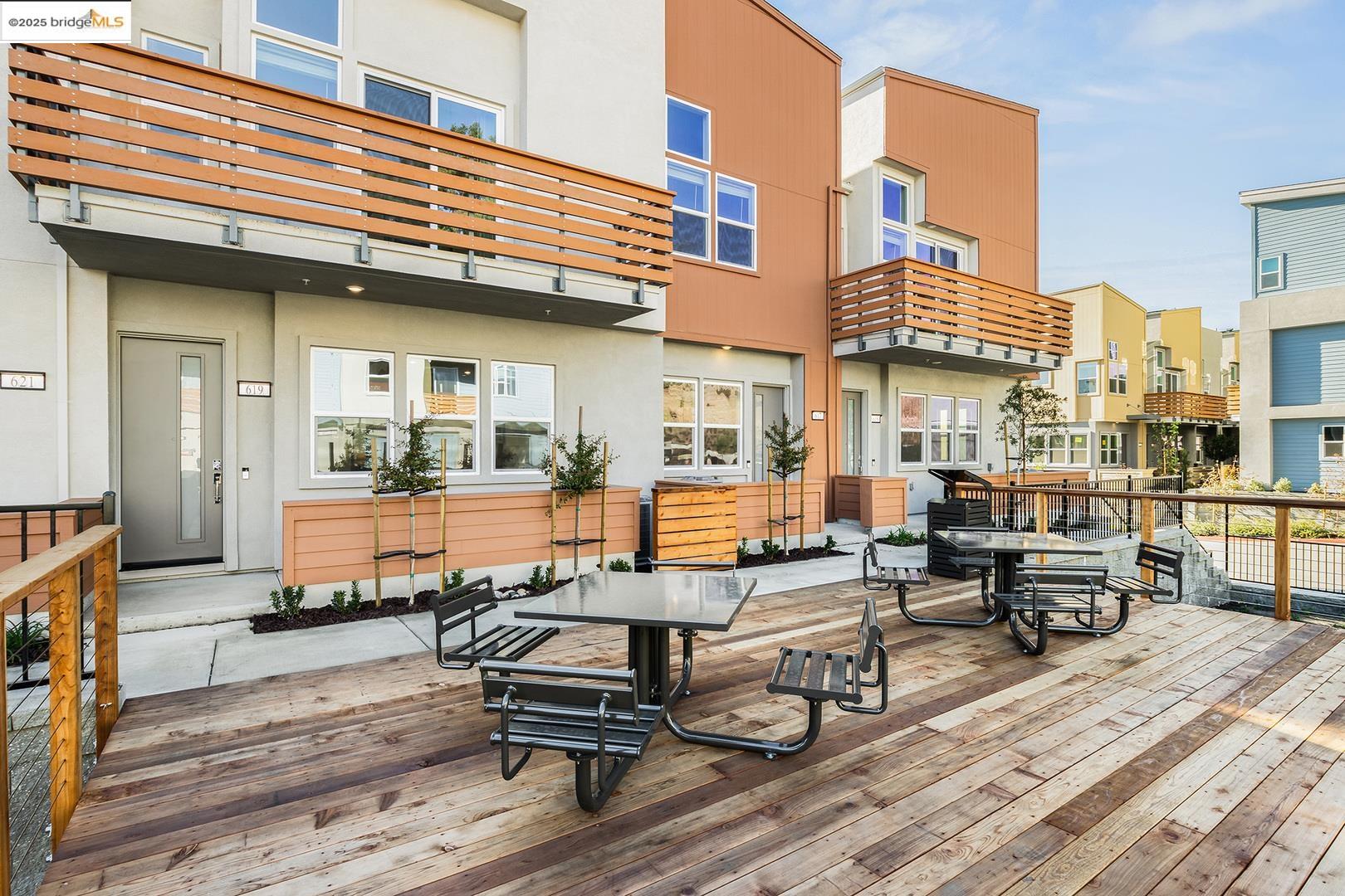 a view of a dinning table and chairs in the patio