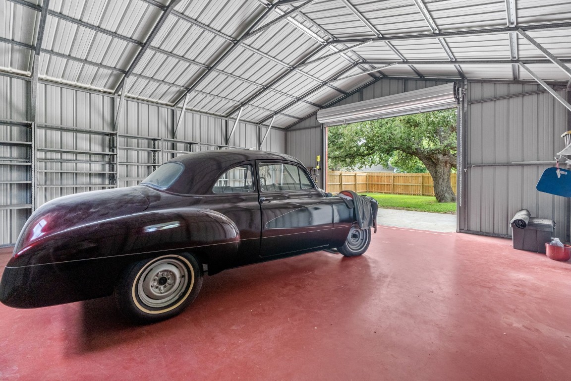 a view of a car in front of a house