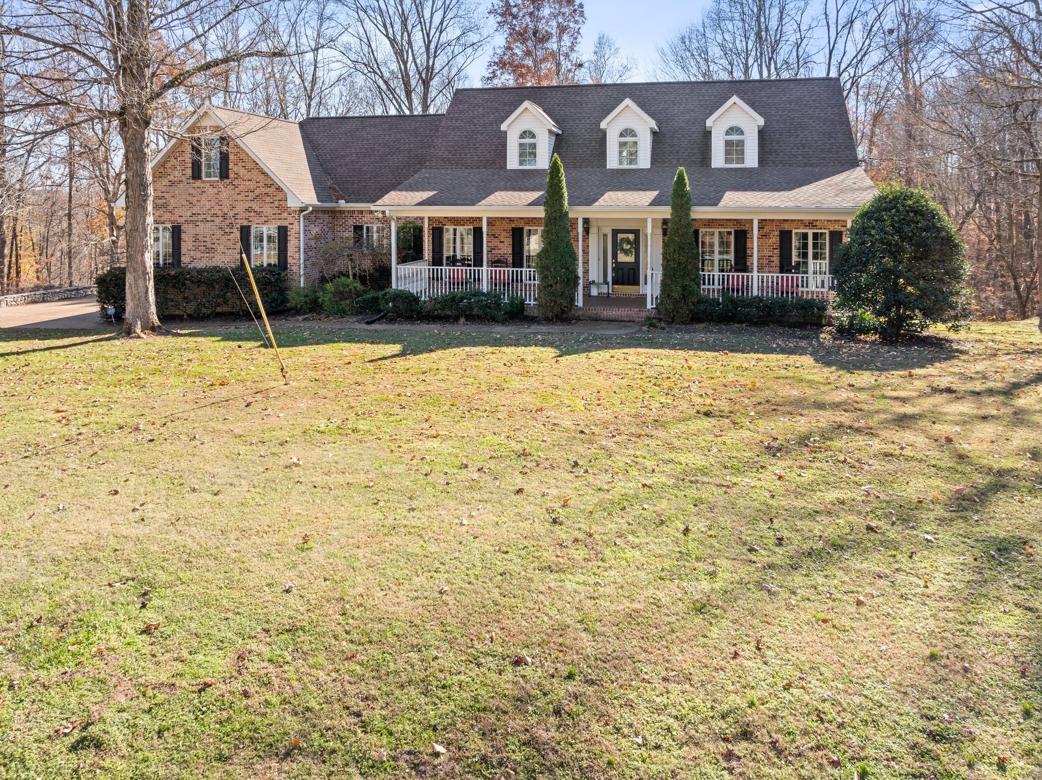 Beautiful home on wooded hilltop setting.