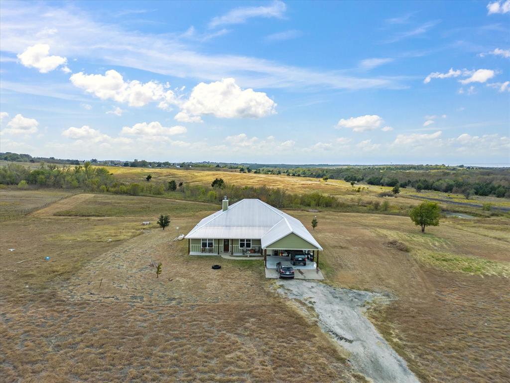 a view of a lake with a big yard