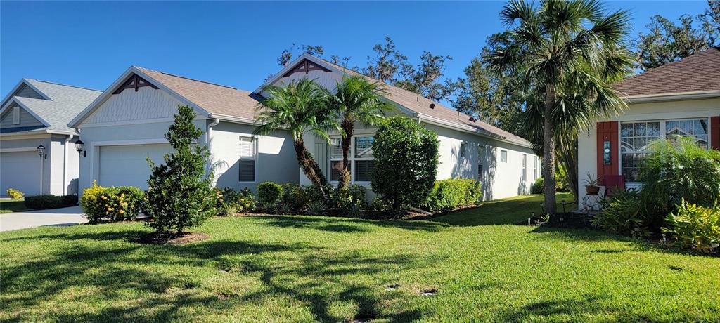 Beautifully landscaped front elevation with new roof