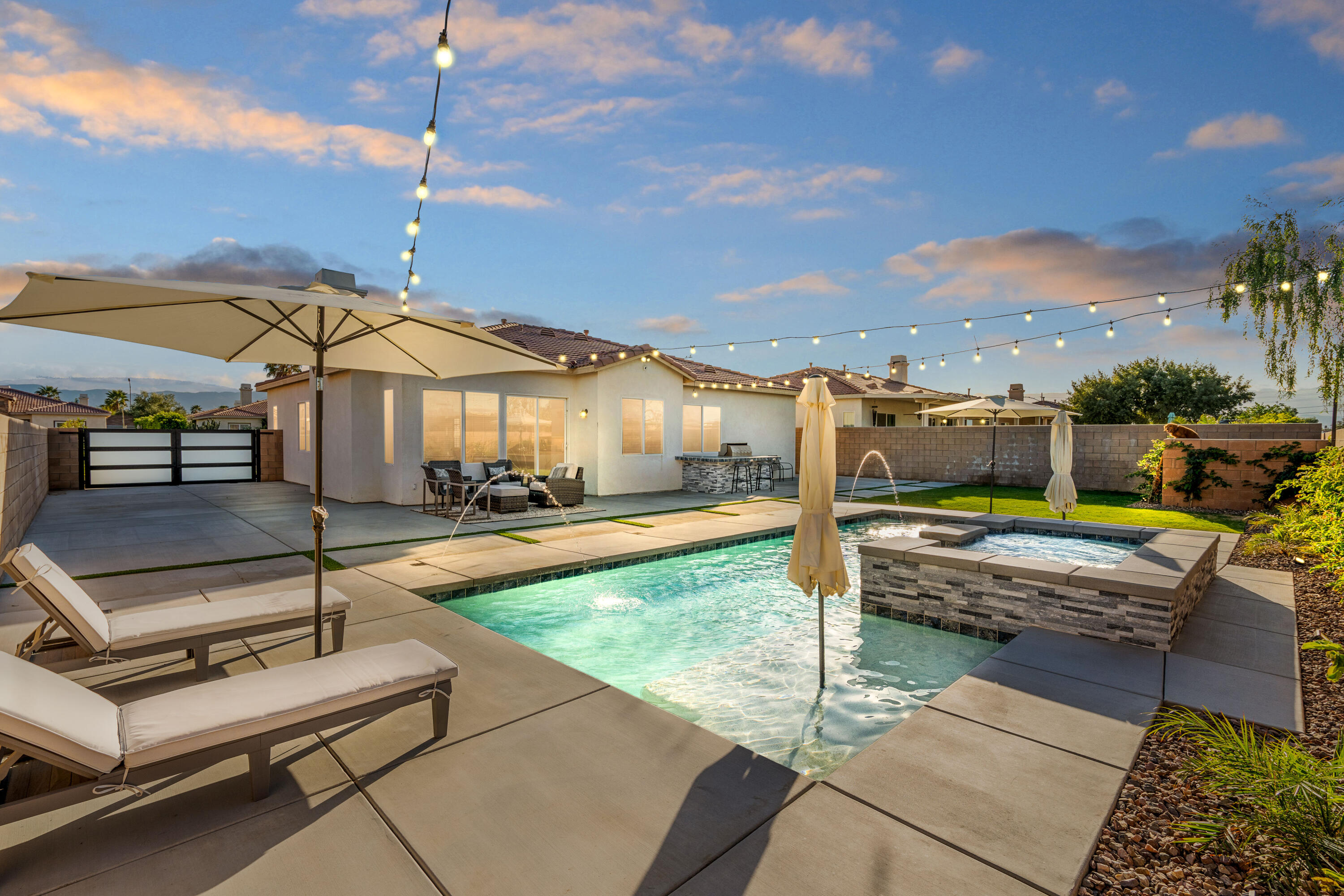 a view of a patio with swimming pool