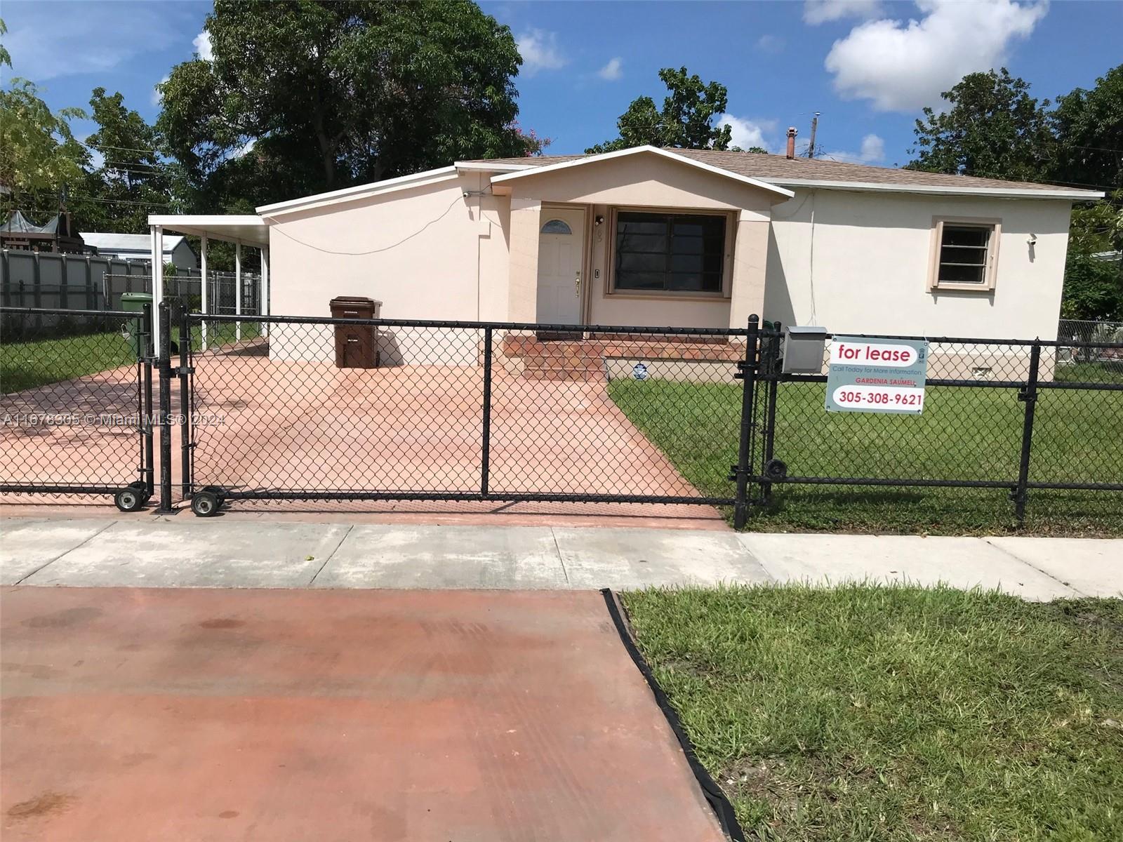 a view of a back yard of the house