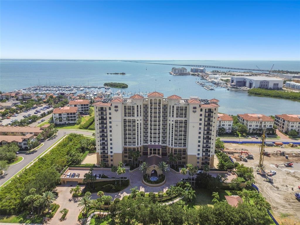 an aerial view of a city with lawn chairs