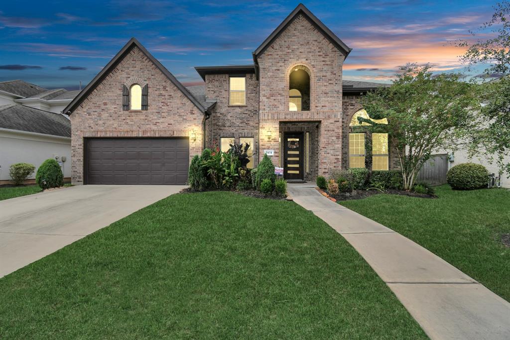 Discover your dream home at 5434 Clouds Creek Lane, nestled in the prestigious Avalon at Riverstone community.