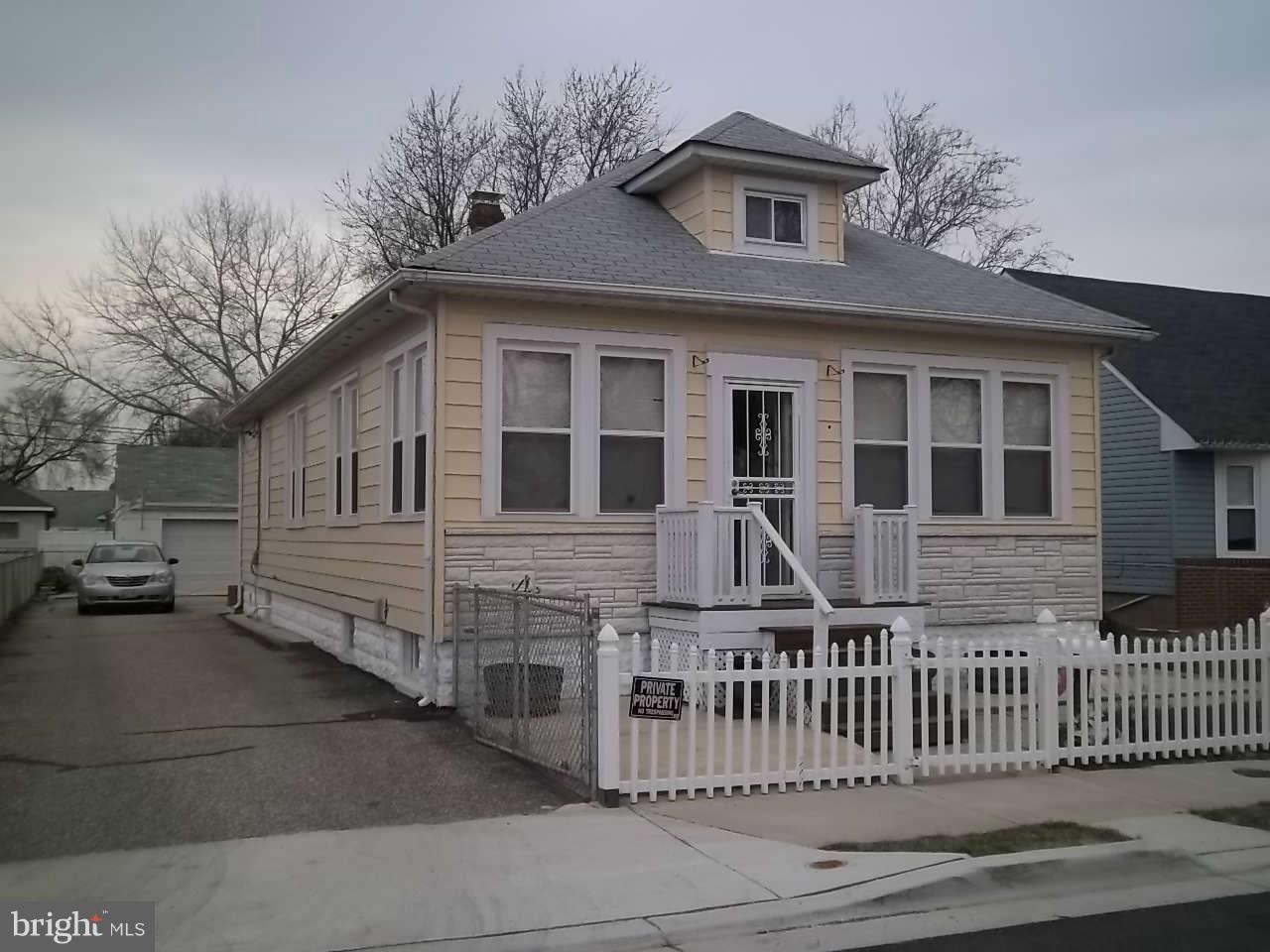 a front view of a house with a porch