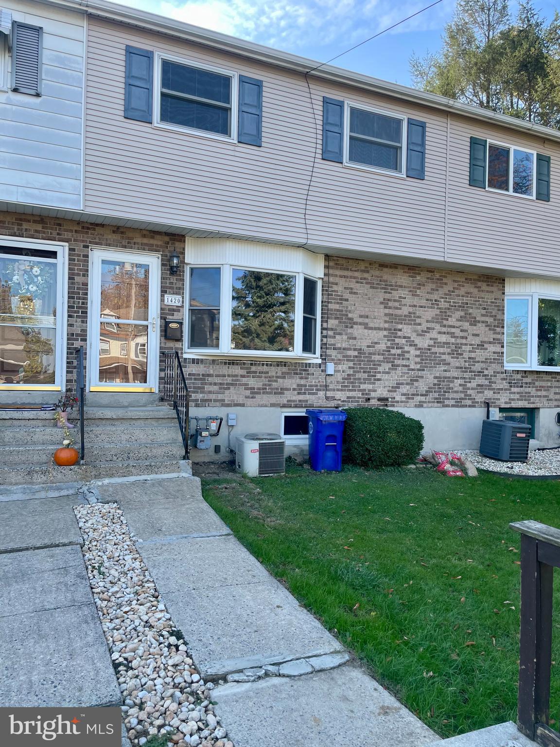 a front view of house with yard