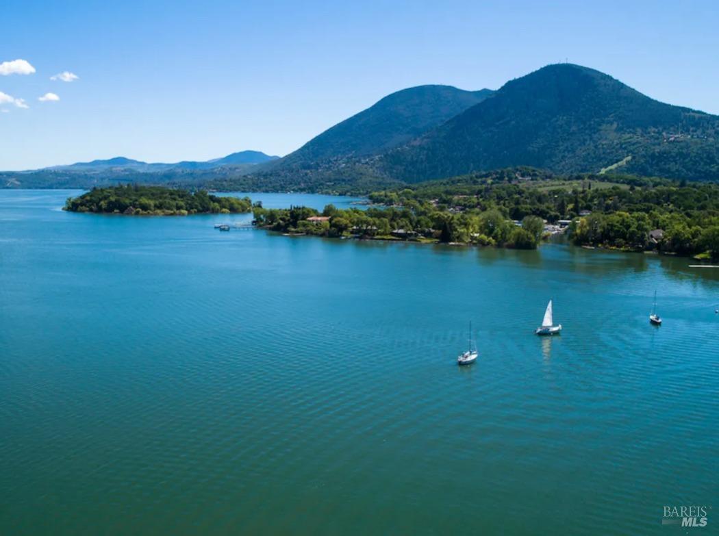 a view of a lake with mountains in the background