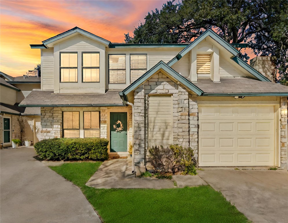 Great location in the community and in North Austin! Only one attached wall by garage.